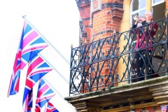 Honorary-Bugler-on-balcony